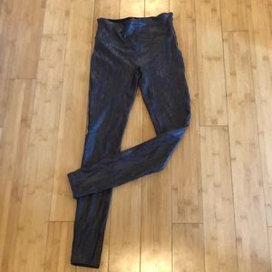 Spanx brown and black faux snakeskin leggings.